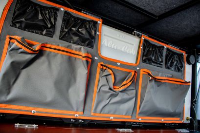 pochettes de rangement canopy Camper Alu Cab sur reservoir d'eau 50L