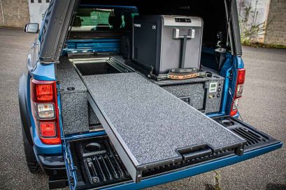 Ford Ranger Raptor bleu préparé par Equip'Raid équipement 4x4 offroad plateau coulissant arb